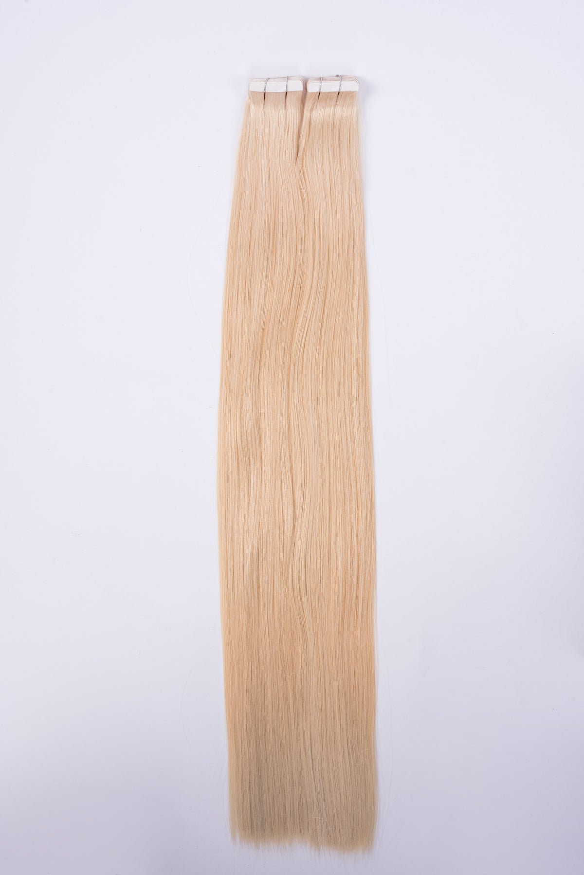 ragasztócsíkos szőke póthaj