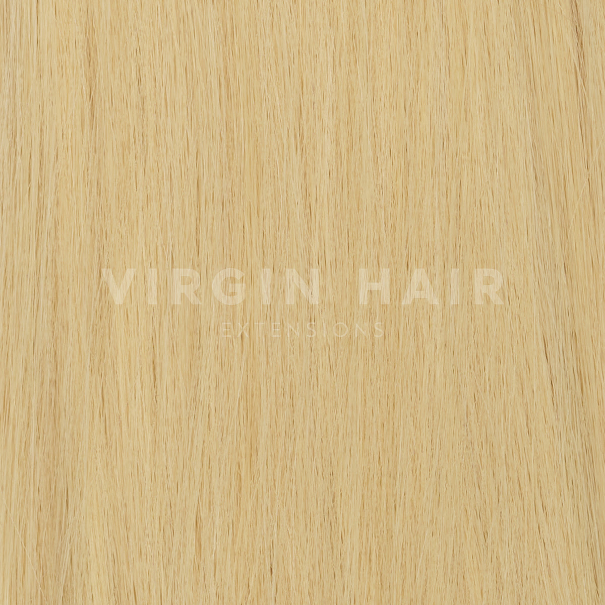 Világos szőke színű hullámos copf